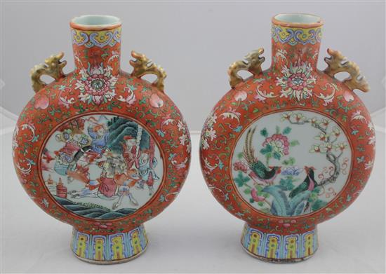 A pair of Chinese famille rose moon flasks, 19th century, 24.2cm, one neck repaired, slight losses to handles